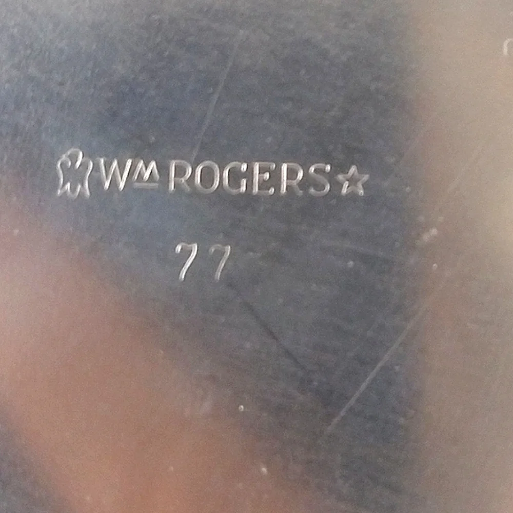 Vintage Rogers footed silver plate trivet
